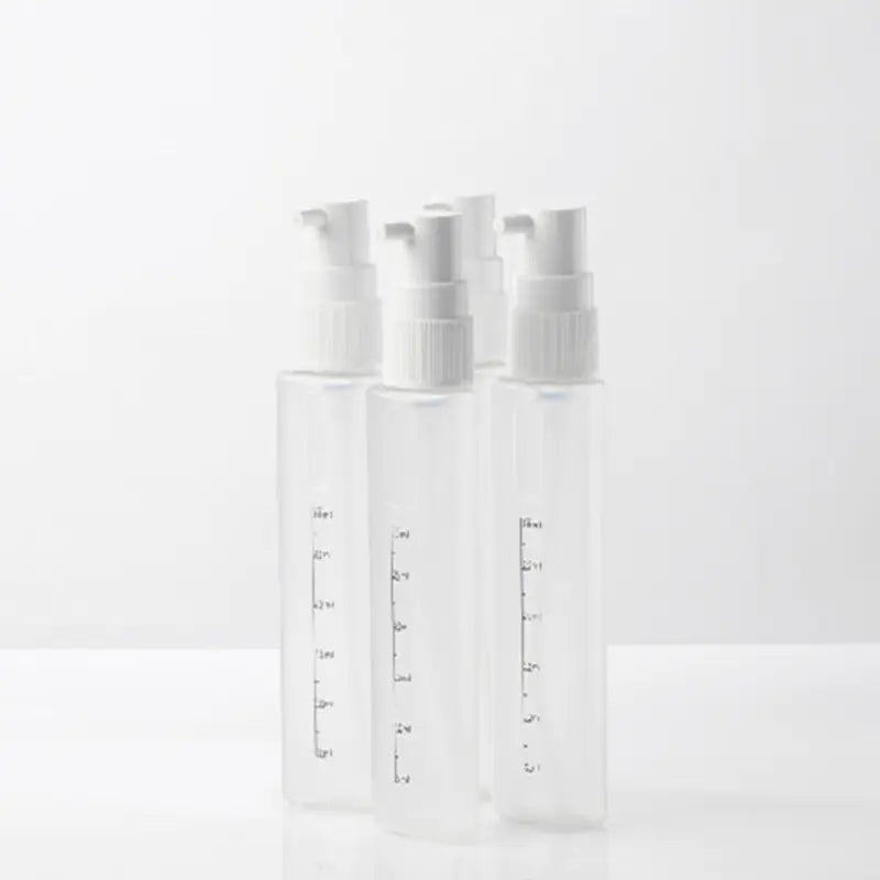 4-in-1 Travel Cosmetic and Shampoo Dispenser Bottles